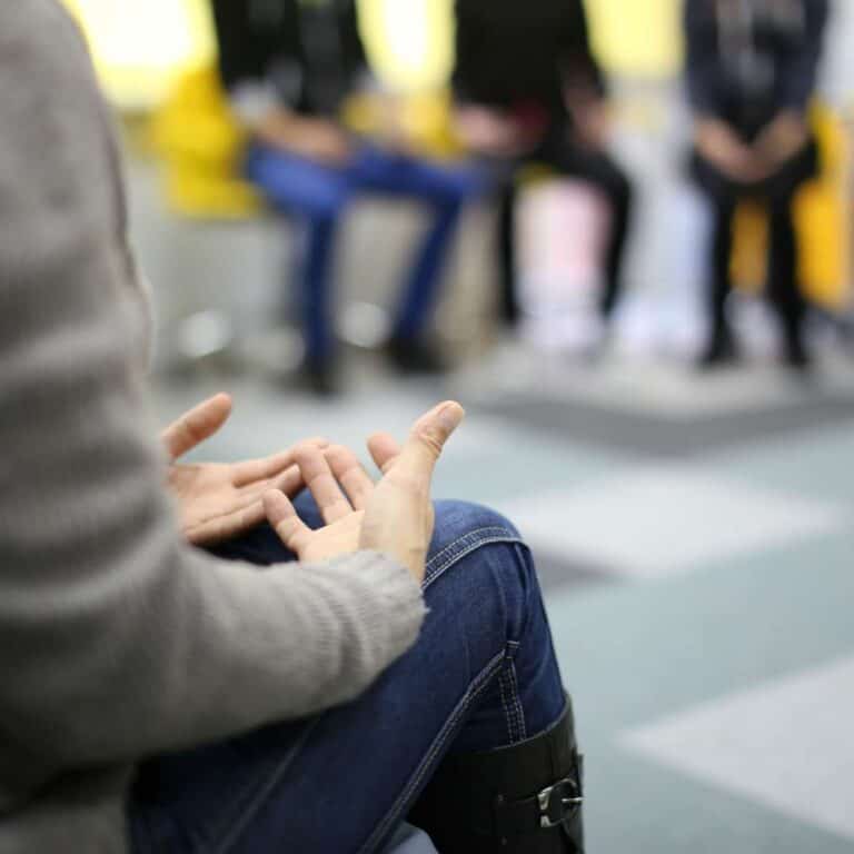  Process Group Therapy Woman Talking at Group Therapy